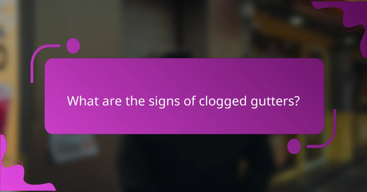 What are the signs of clogged gutters?